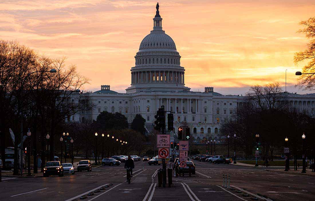 View of U.S. Capitol against the sunset.