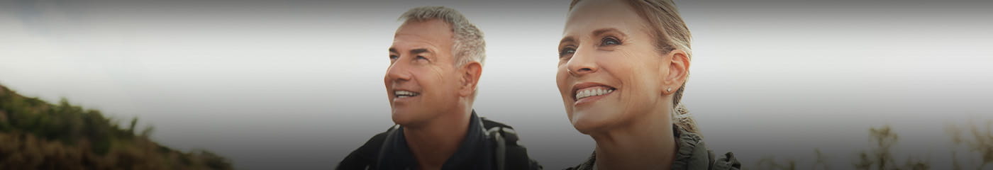Two people smiling.