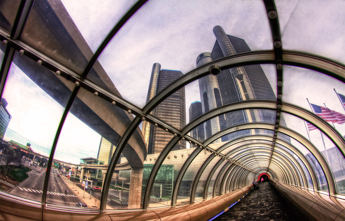 Image of tunnel leading to skyscrapers