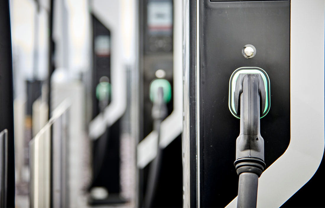 Close-up photo of an electric charging station for automobile vehicles.