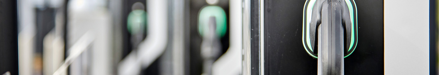 Close-up photo of an electric charging station for automobile vehicles.