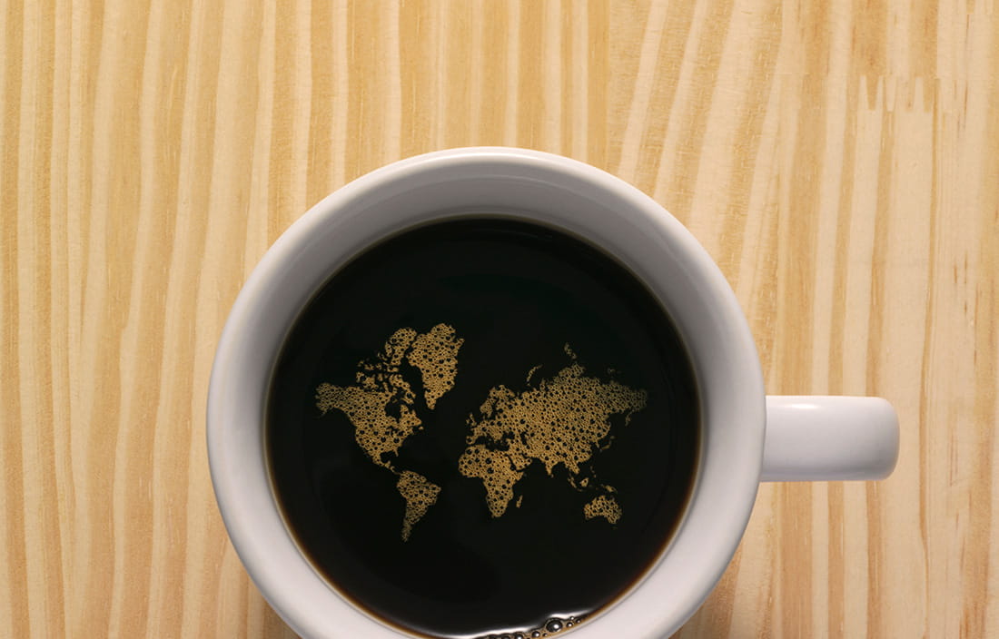 Image of coffee cup with map inside