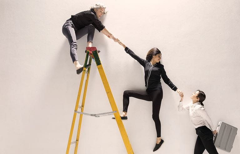 Image of women on ladder