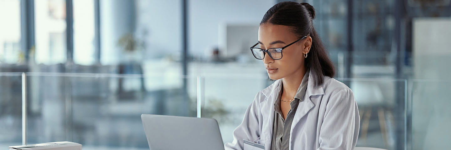 Doctor working on their laptop.