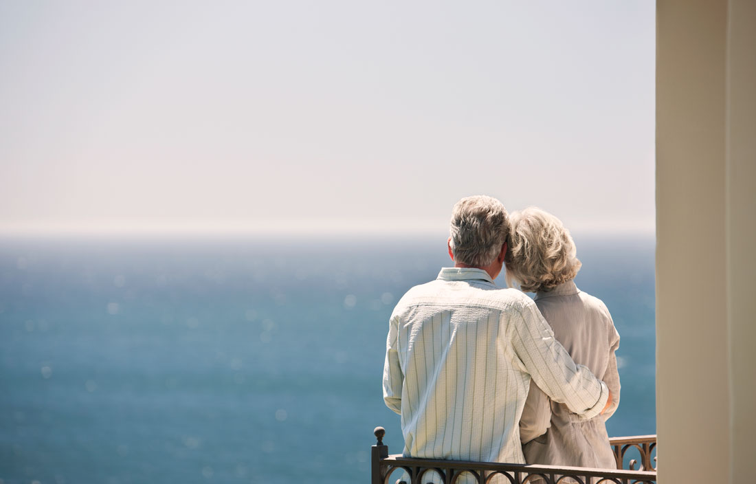 A couple looking out at the water. 