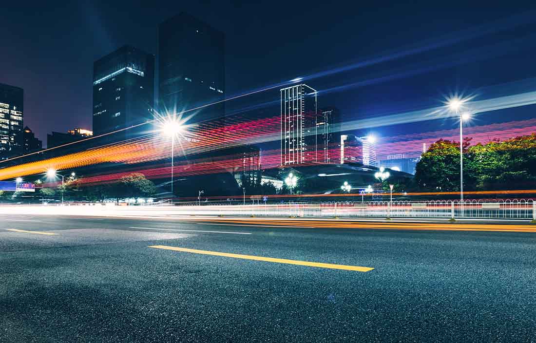 Outside photo of a city street with blurred lights