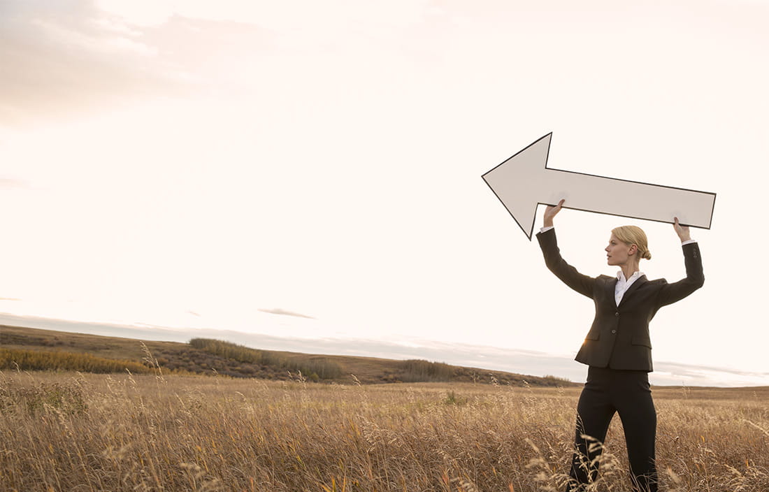 Image of woman holding arrow