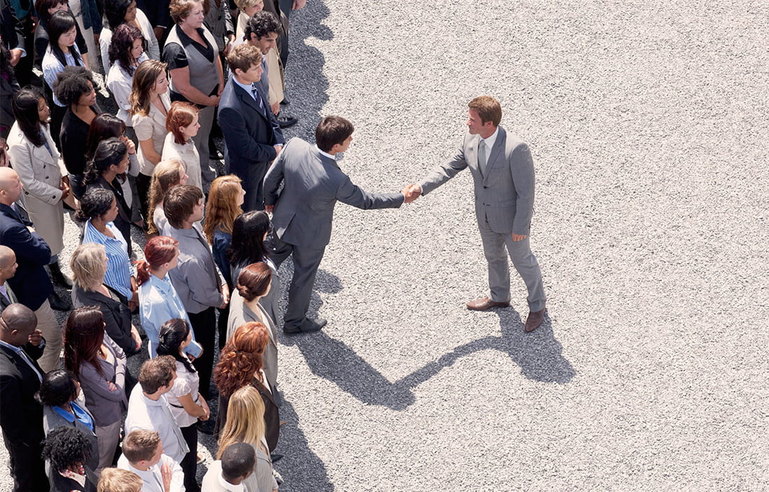 Image of men shaking hands 