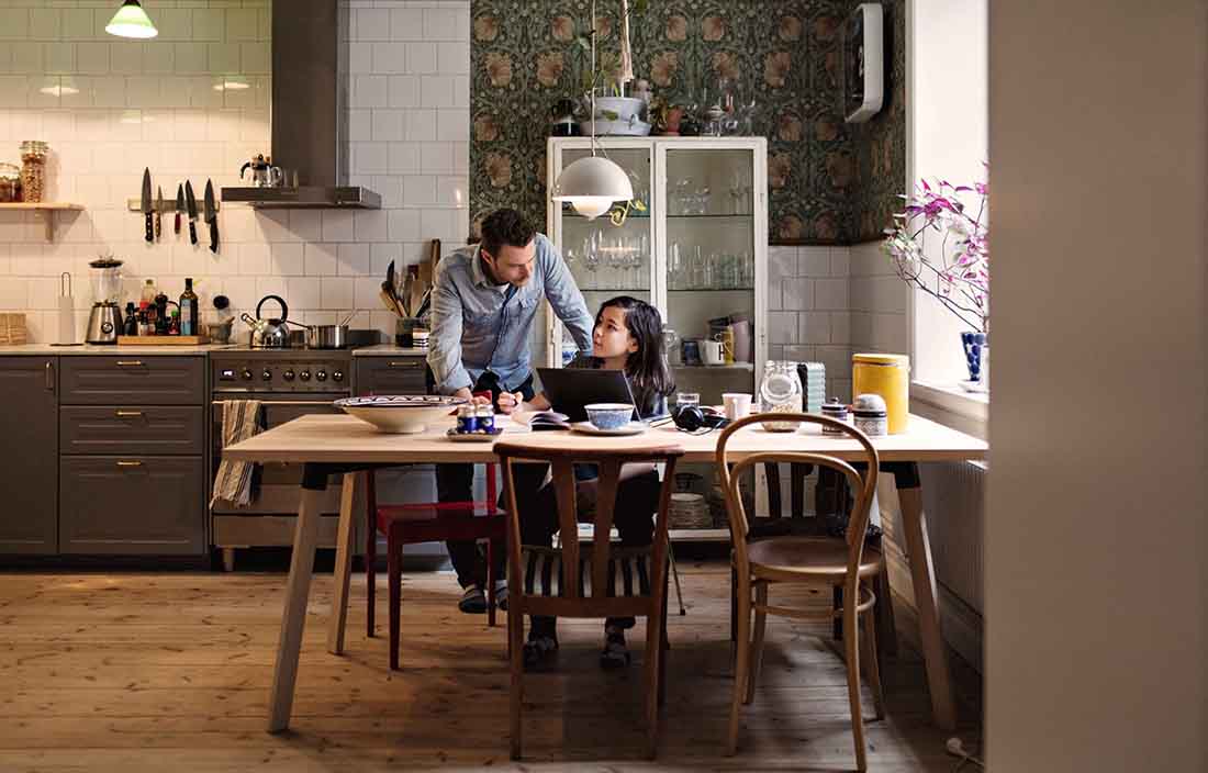 Family having breakfast at a table.