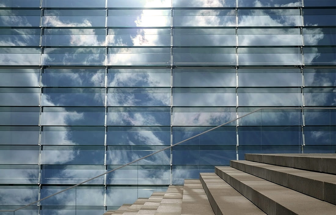 Stairs with reflection of buildings