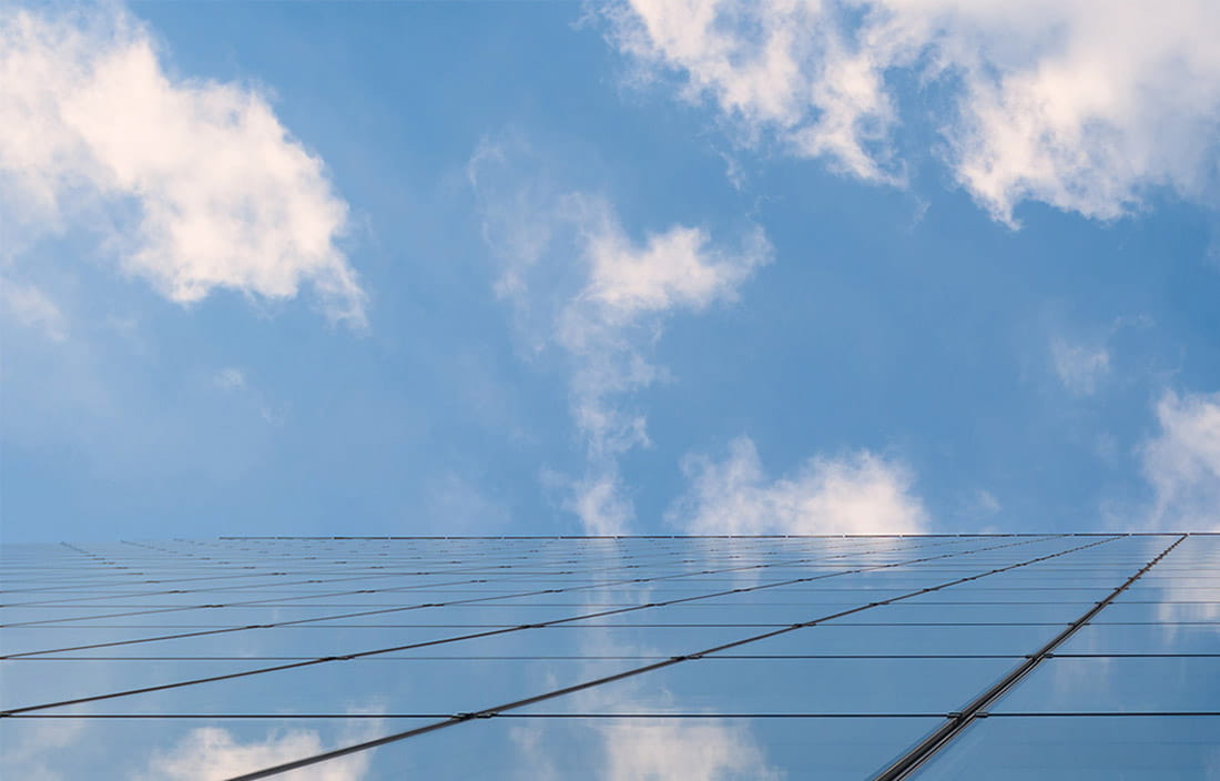 Looking up at building and sky