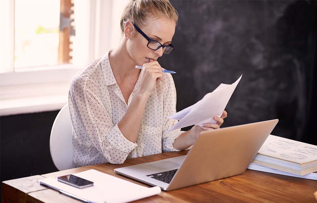 professional woman working on her computer