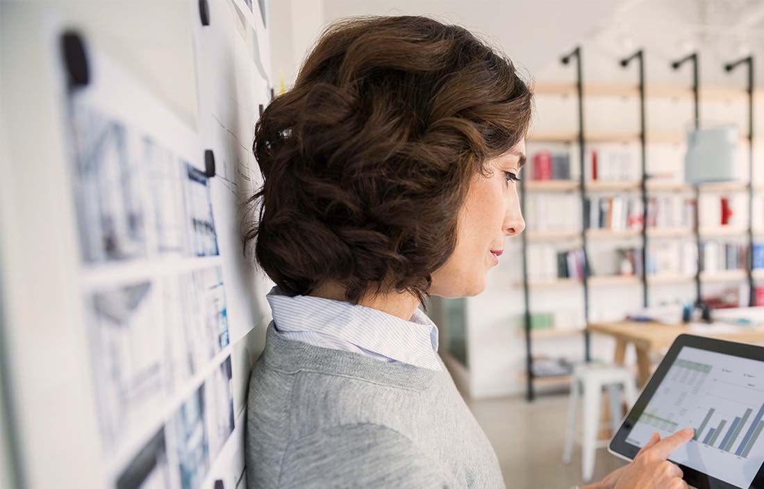 Business woman working on a tablet