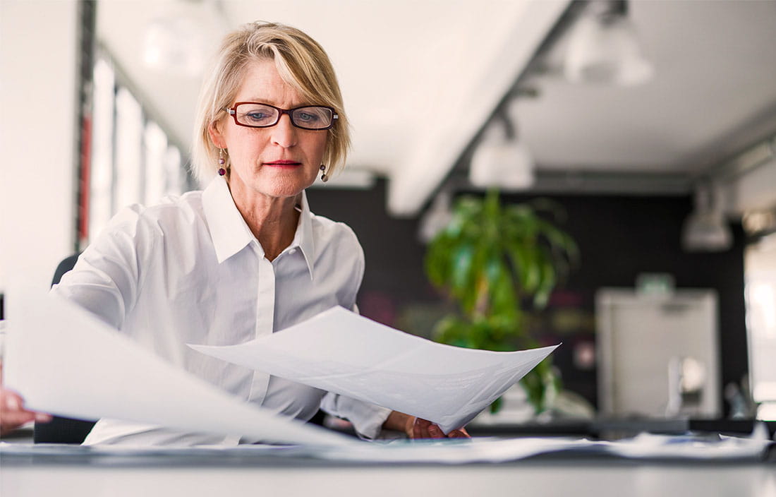 Business woman working with papers