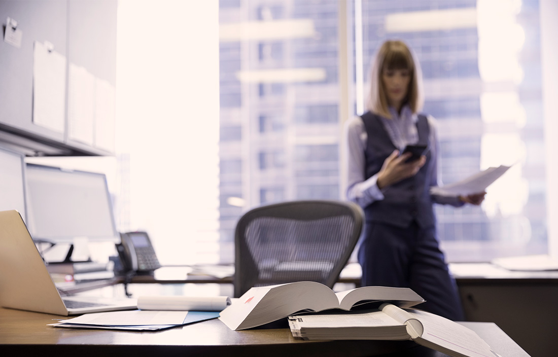 Woman standing in her office