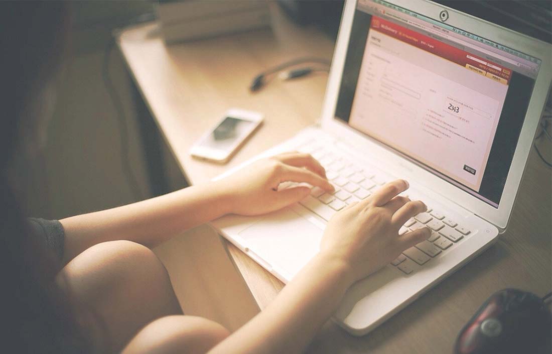 Woman working on laptop