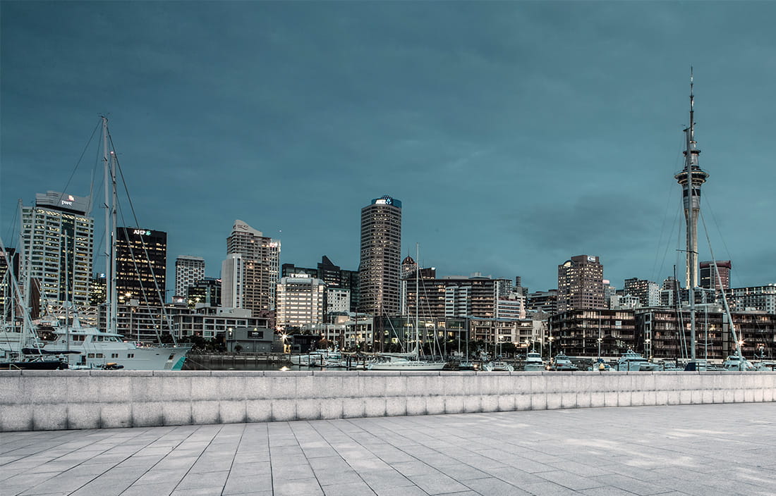 skyline of city with an incredibly teal sky