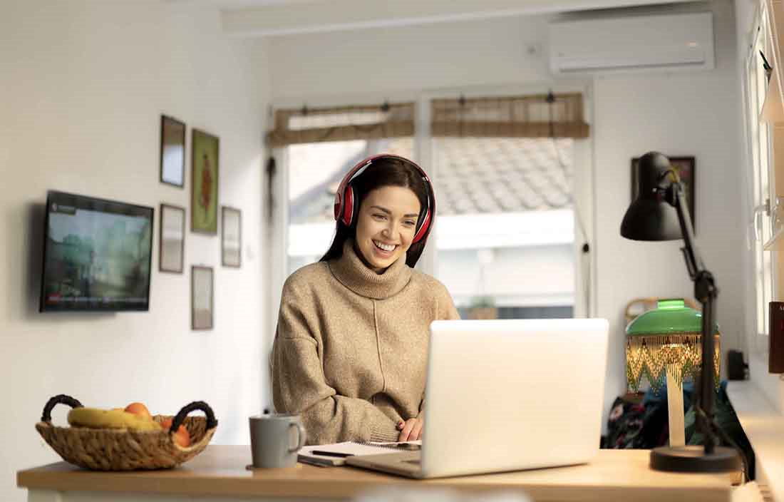 Adult on computer in office