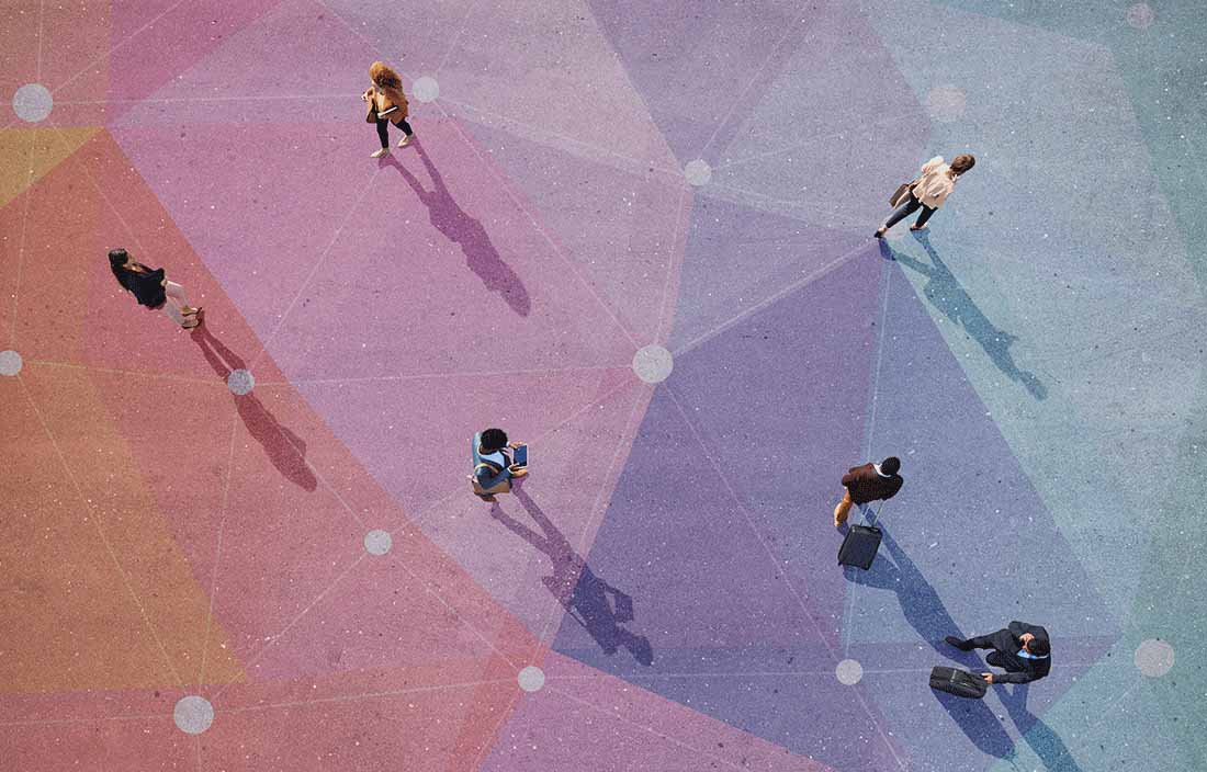 Business professionals standing on a painted sidewalk/concrete area.