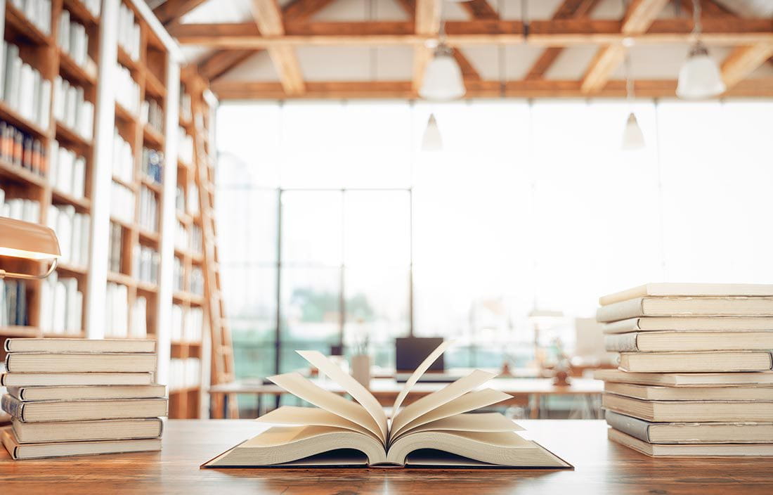 Close-up of a book open on a table.