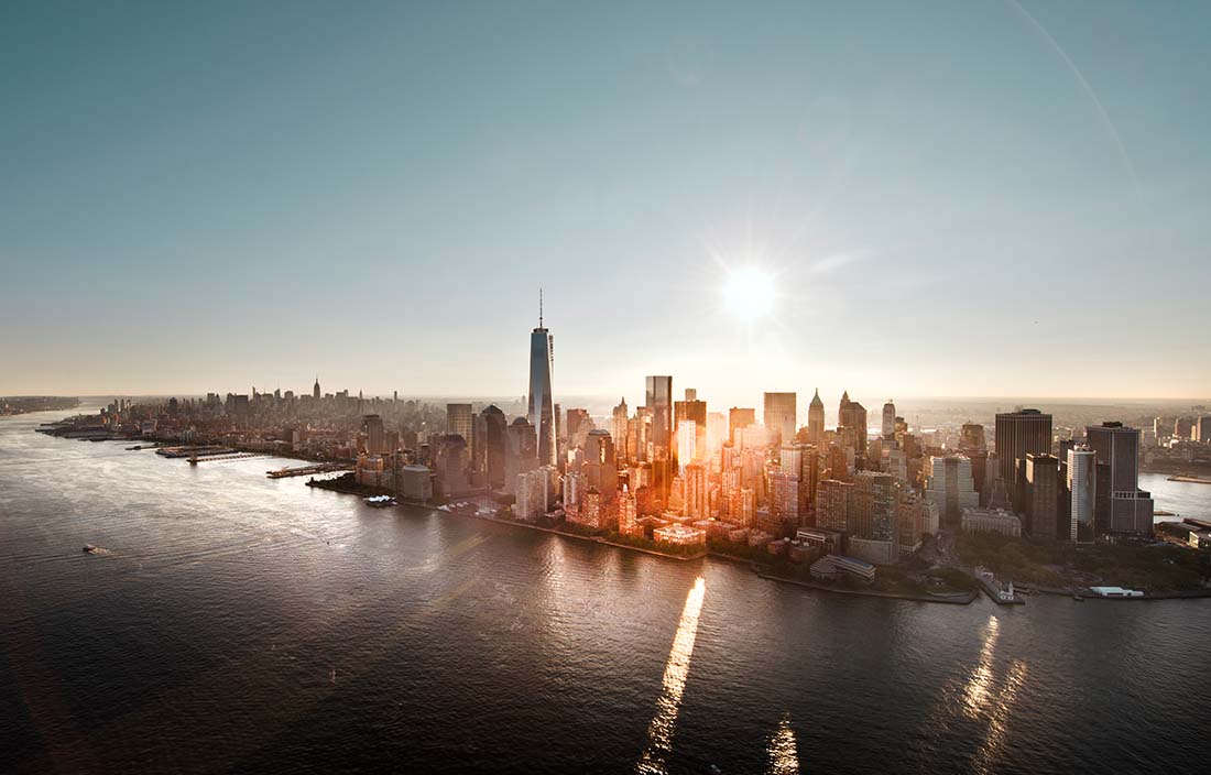 City skyline with a sun rising in the morning