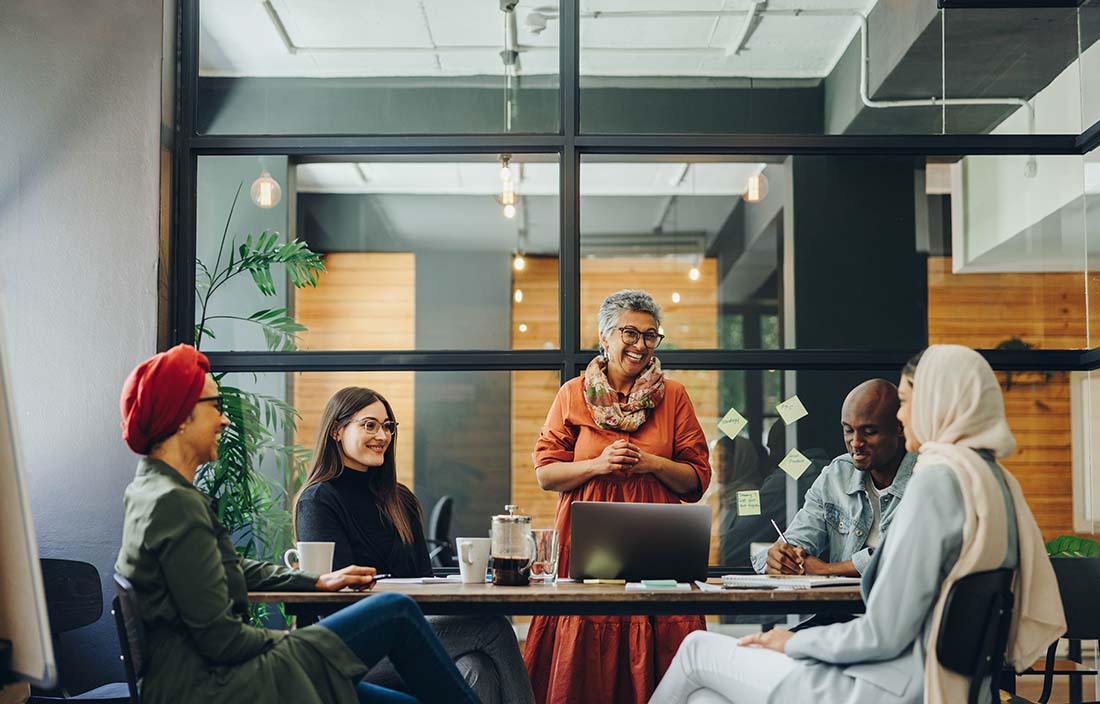 Group of financial professionals having a discussion about cybersecurity.