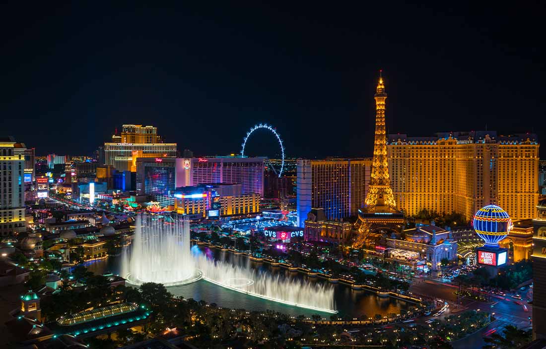 View of Las Vegas skyline lit up at night.