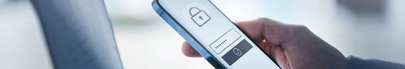 Business professional using two-factor authentication to log into their account.