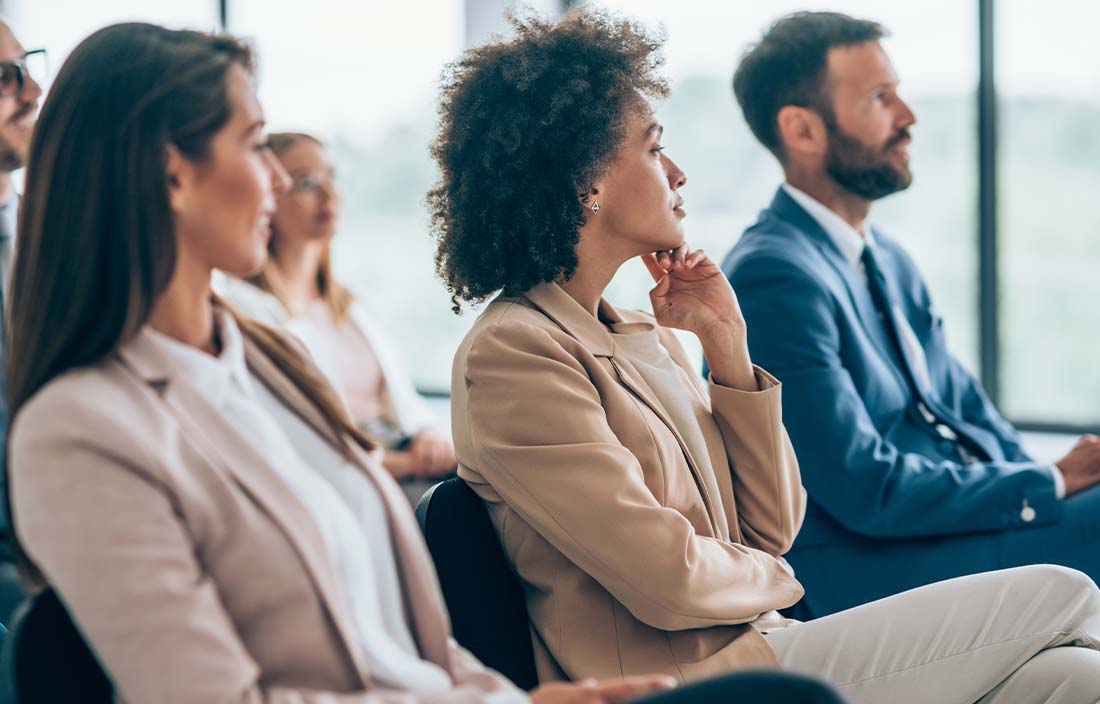 Business professionals attending a conference.