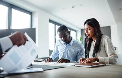 Public sector finance professionals reviewing the 2025 Compliance Supplement
