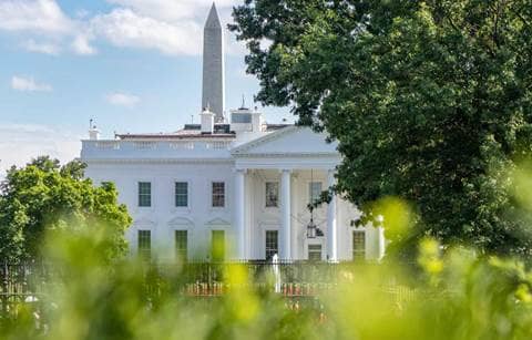 Exterior view of White House during the day.