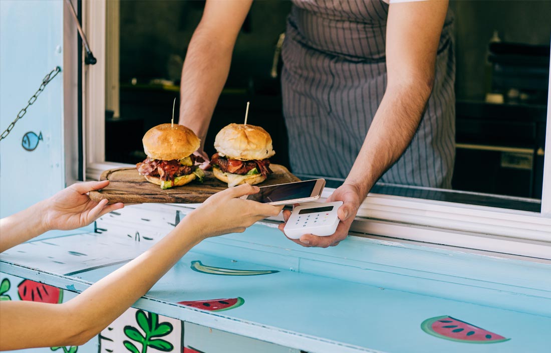 Photo of a food truck serving burgers