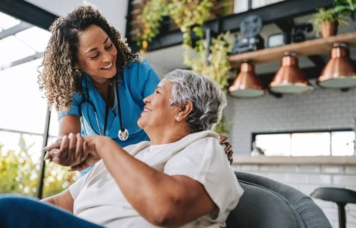 Nurse talking to their patient.