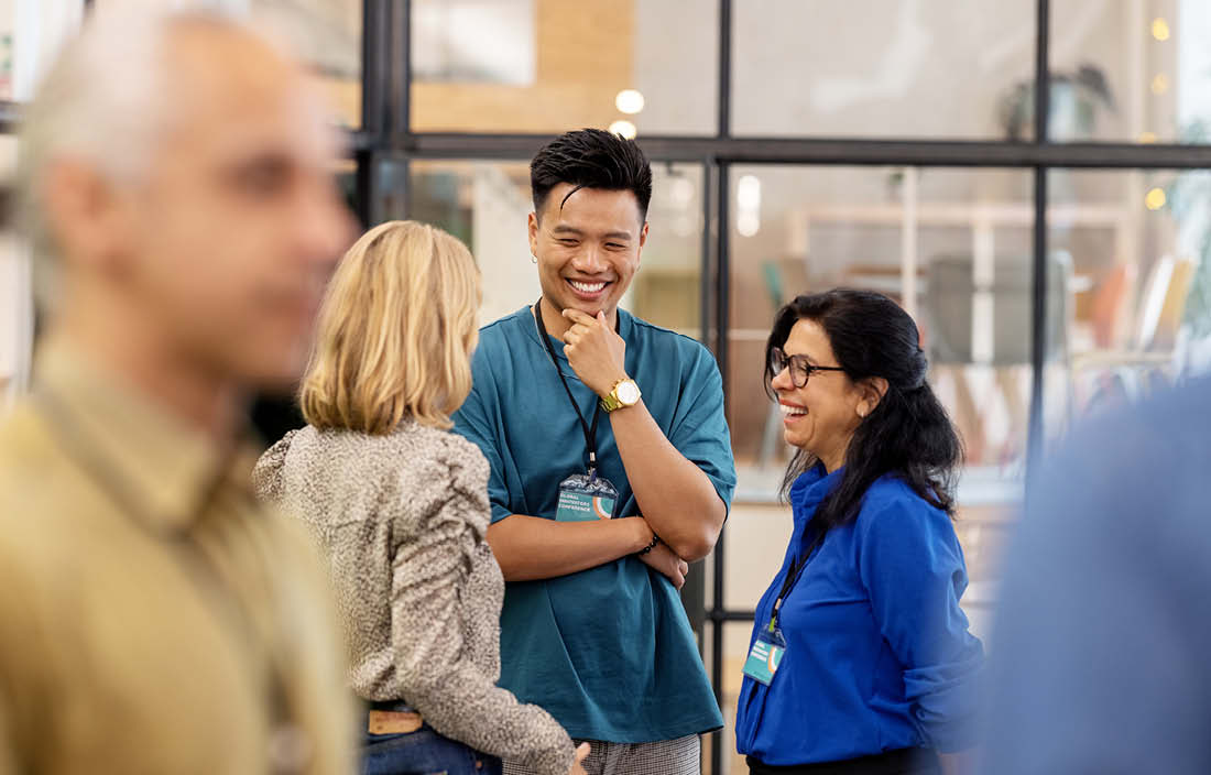 Group of business professionals at a networking event.