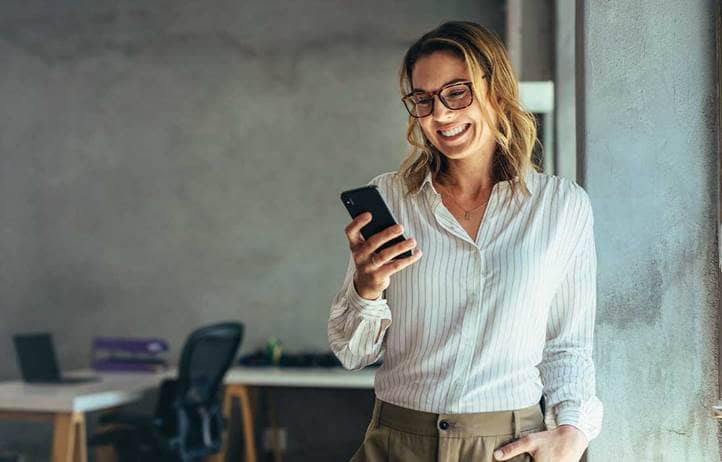Job seeker looking at an email on their phone.