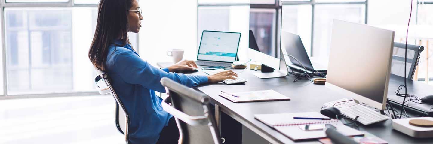 Business professional at their desk.