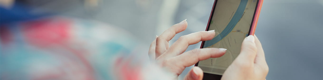 women using map on phone