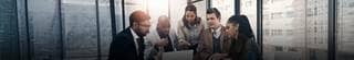 Group of tax professionals discussing a complex issue.