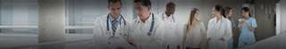 Doctors standing together talking.
