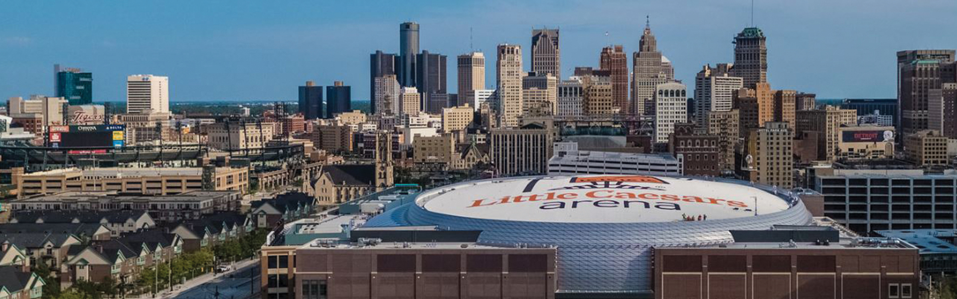 View of Little Caesars Arena and Detroit, Michigan skyline.
