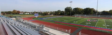 Warren Consolidated Schools football field and stands.