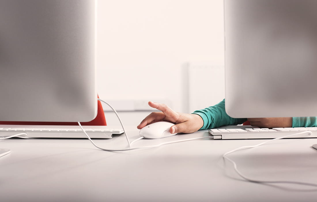 Person using mouse on computer