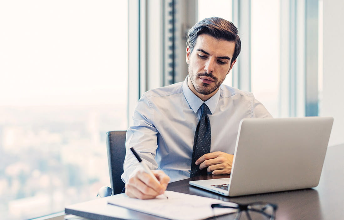 Business person working at his desk.