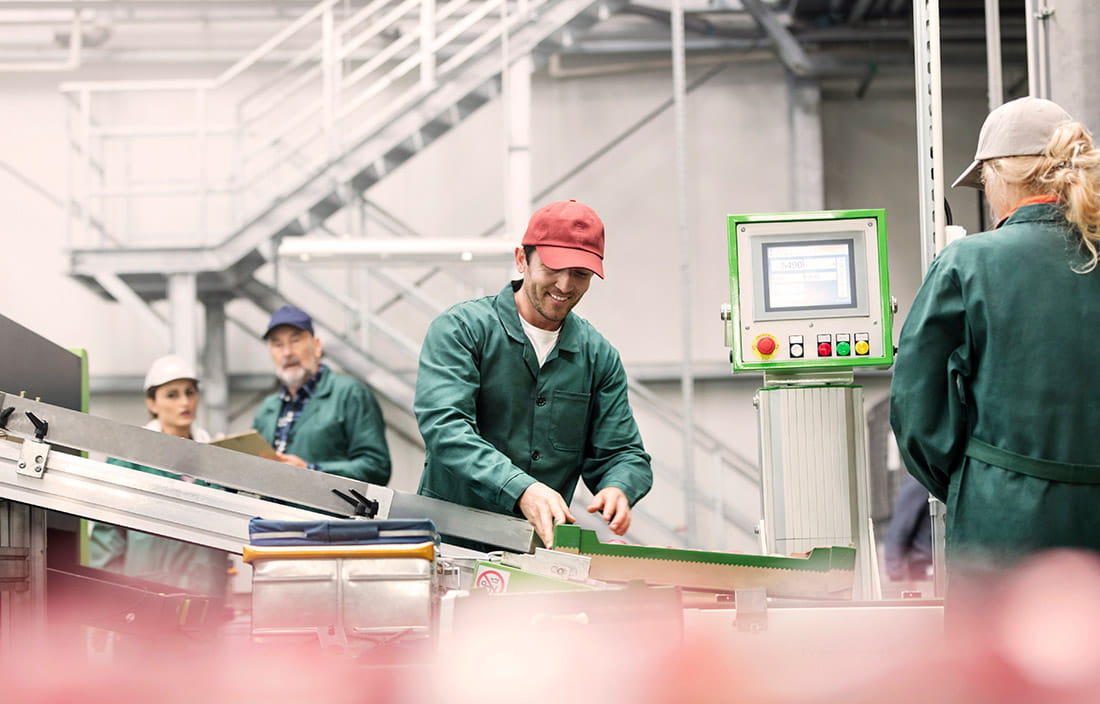 Image of man working on assembly line