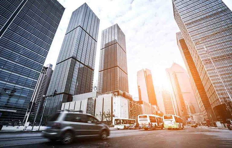 Image of city skyscrapers and traffic.