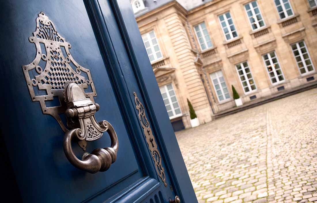 A door opening to a British courtyard