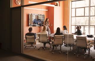 People sitting in a conference room in a meeting