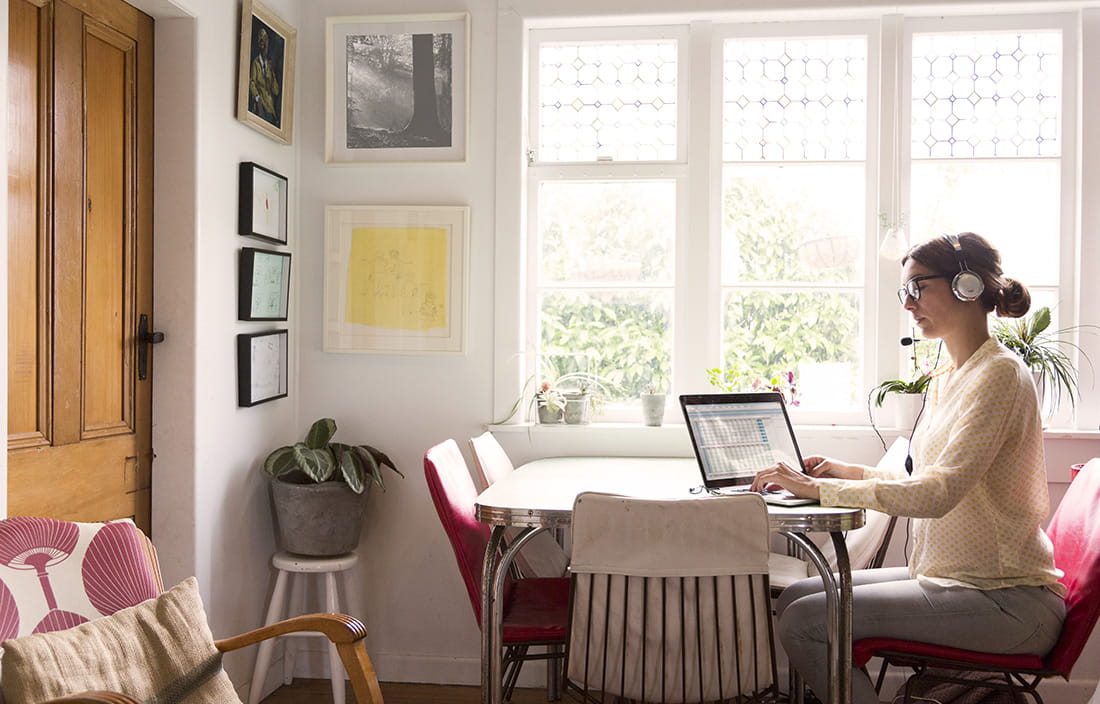 Woman working from home on her laptop