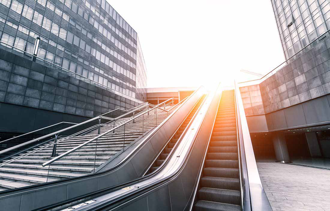 Staircase and escalator in a downtown business area.