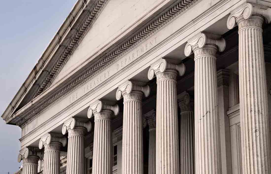 Outside of a building with large columns